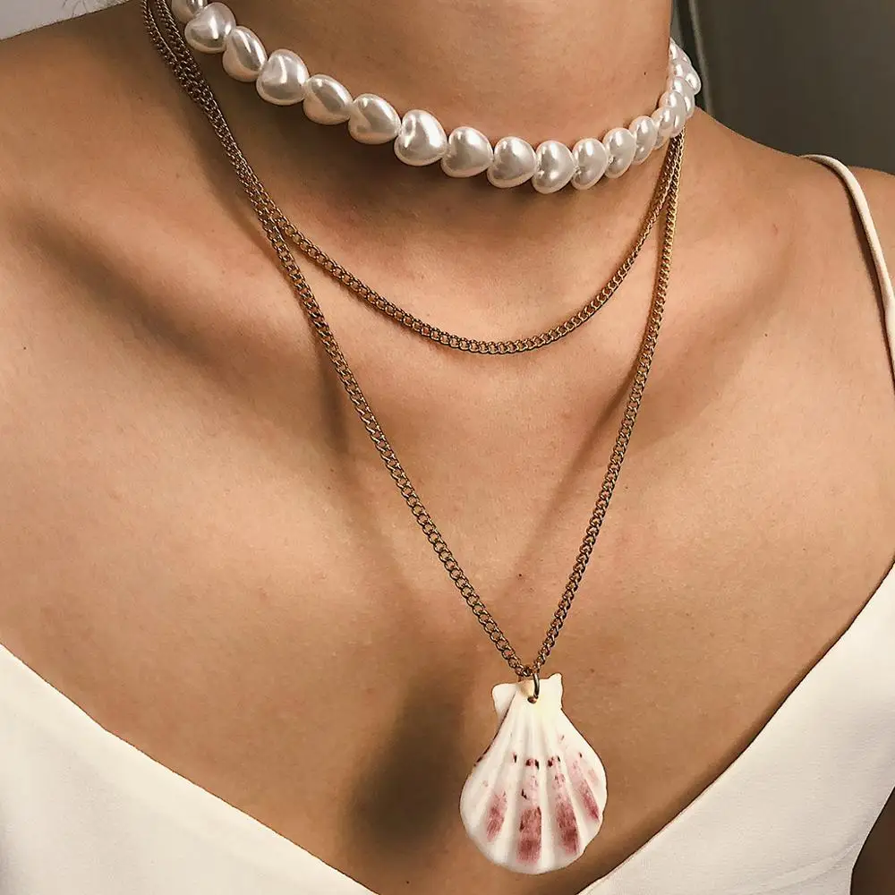 

KMVEXO 2019 Trendy Gold Color Layers Women Boho Statement Fan Shell Chain Necklace Lady Heart Pearl Choker Necklace Jewelry Gift