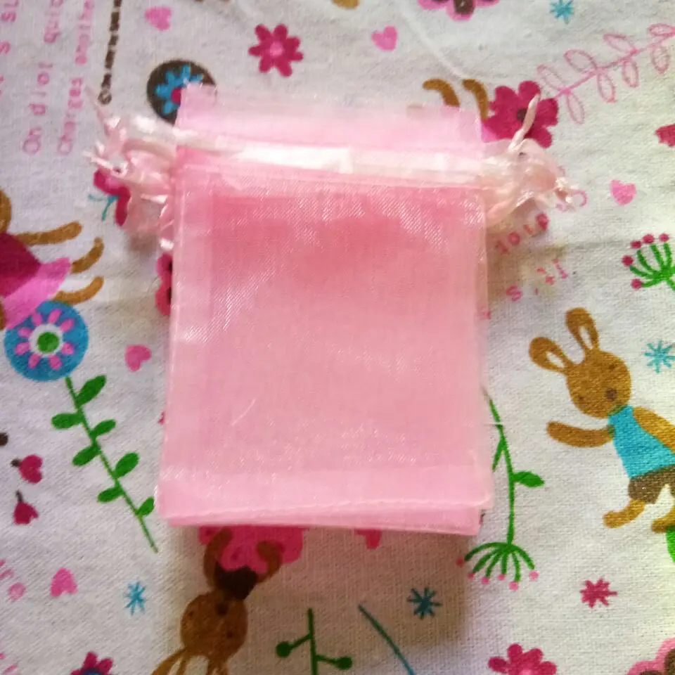 

Hot 100 Pcs/lot Pink Organza Bags 7x9 9x12 10x15 13x18 15x20 cm Wedding Gift Packaging Drawstring Bags&Jewelry Pouches 2019