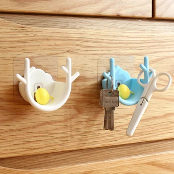 

New wall mounted Debris storage rack outlet power cord hanger organizer key holder Self-adhesive wall hook home decor