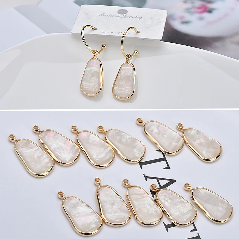 

Copper-plated real gold irregular elliptical resin imitating shellfish white copper-edged DIY Earrings material accessories