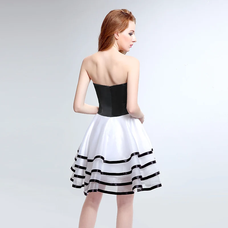 Abito da cocktail bianco e nero