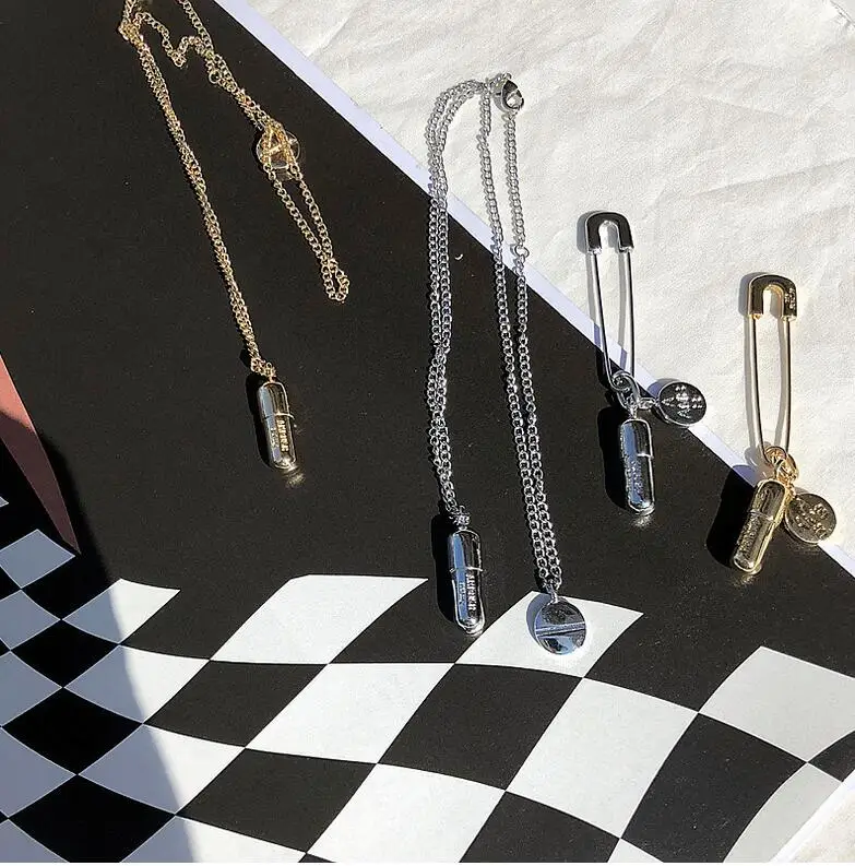

2019 new cool wind European and American fashion street design metal wind earrings capsule shape earrings 1pcs