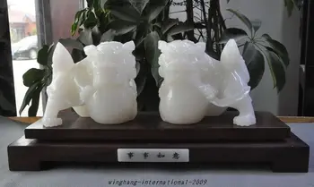 

Chinese Fengshui Natural White jade Hand-Carved Foo Dog Lion Lucky Statue Pair