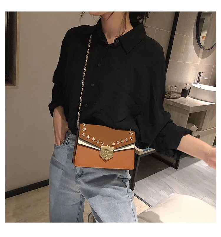 Retro rivet bag design sense lady bag clamshell PU leather lady crossbody bag chain bag new bag