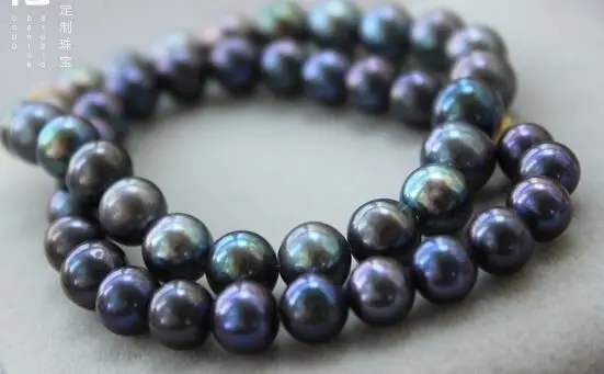 

Charming AAA 18"10-11mm genuine tahitian black pearl necklace
