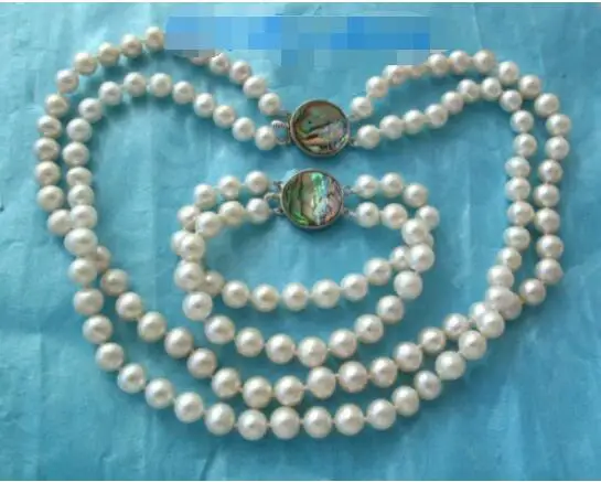 

Free Shipping >>>>> Double Natural White Freshwater Pearl Necklace Bracelet SET Abalone Clasp