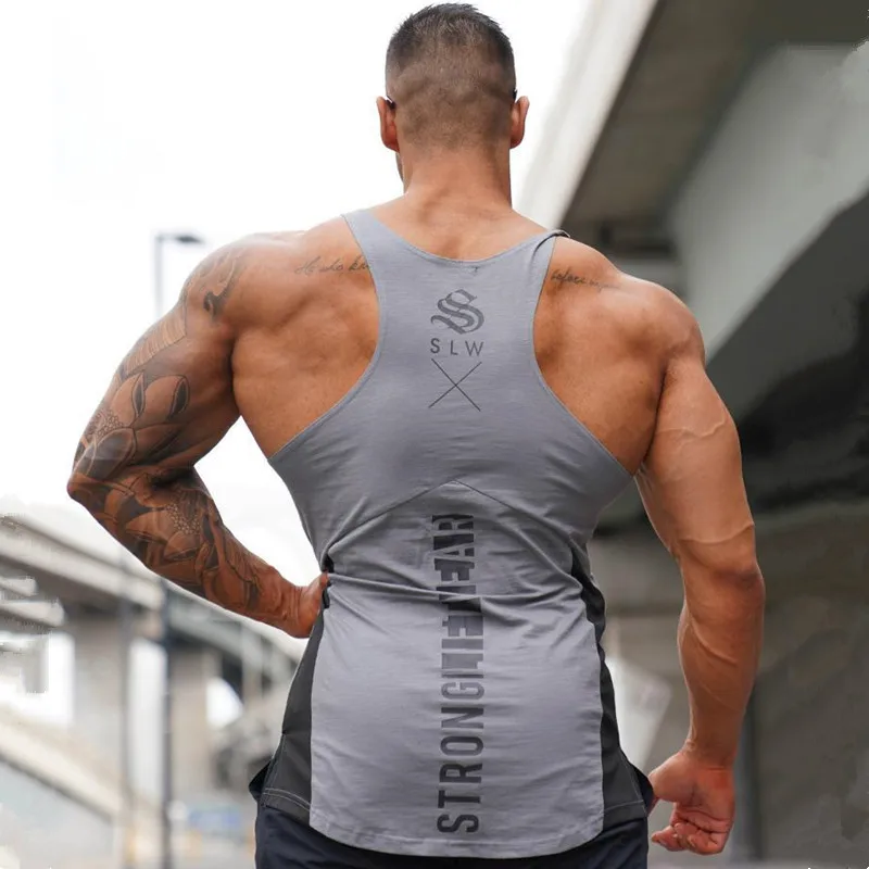 

New Muscle Men Tank top Gyms Workout Fitness Bodybuilding sleeveless shirt Male Cotton clothing Casual Singlet vest Undershirt