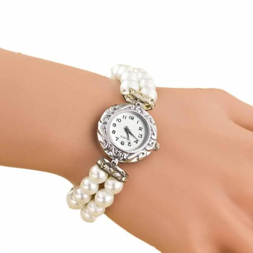 

Luxury Women Students Beautiful Fashion Brand New Golden Pearl Quartz Wrist Watches Simple elegant Ladies women's Bracelet watch