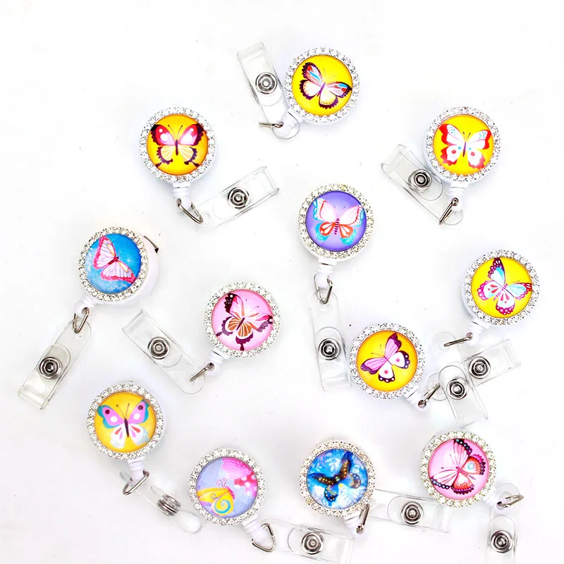 

12 pcs/lot butterfly with Diamond Retractable Badge Reel Student Exihibiton ID Name Card Badge Holder Office Supplies K162