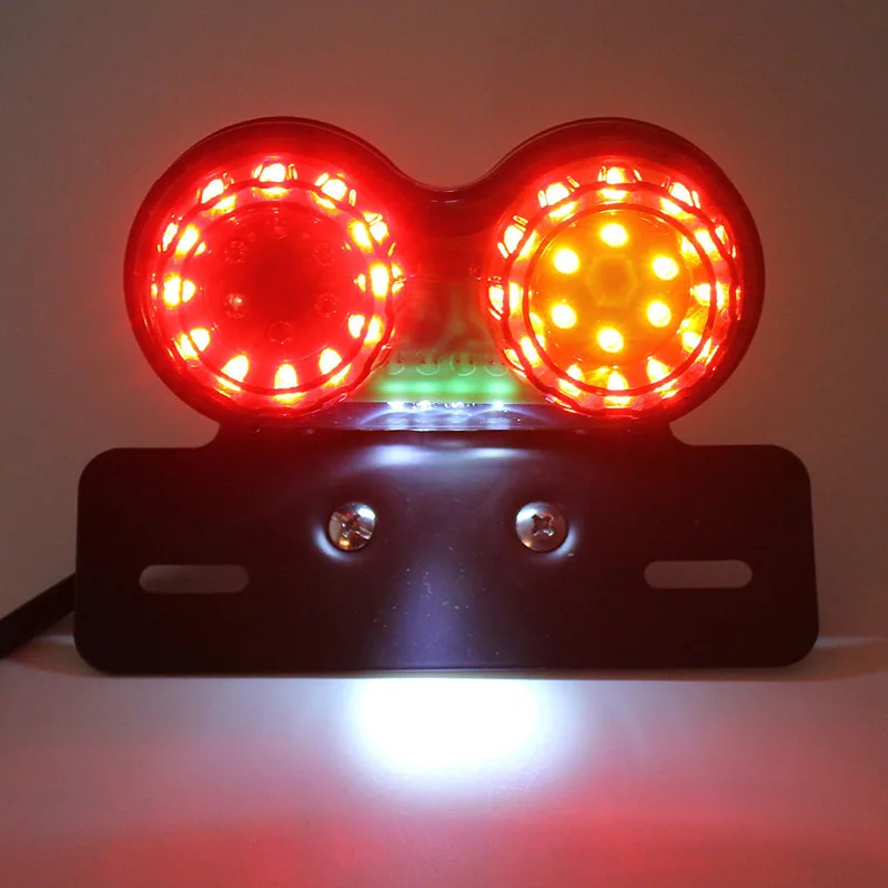 

Universal Motorcycle Dual LED Tail Light Smoked Lens Plastic Integrated Light Turn Signal Brake Light Rear Driving Lamp