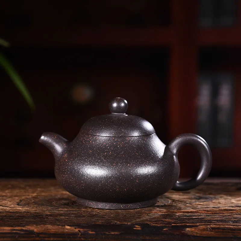 

Enameled Pottery Teapot Quality Goods Full Manual Raw Ore Black Zhu Niyu Ball Kong Kong Fu Teapot Tea Set Suit Wholesale