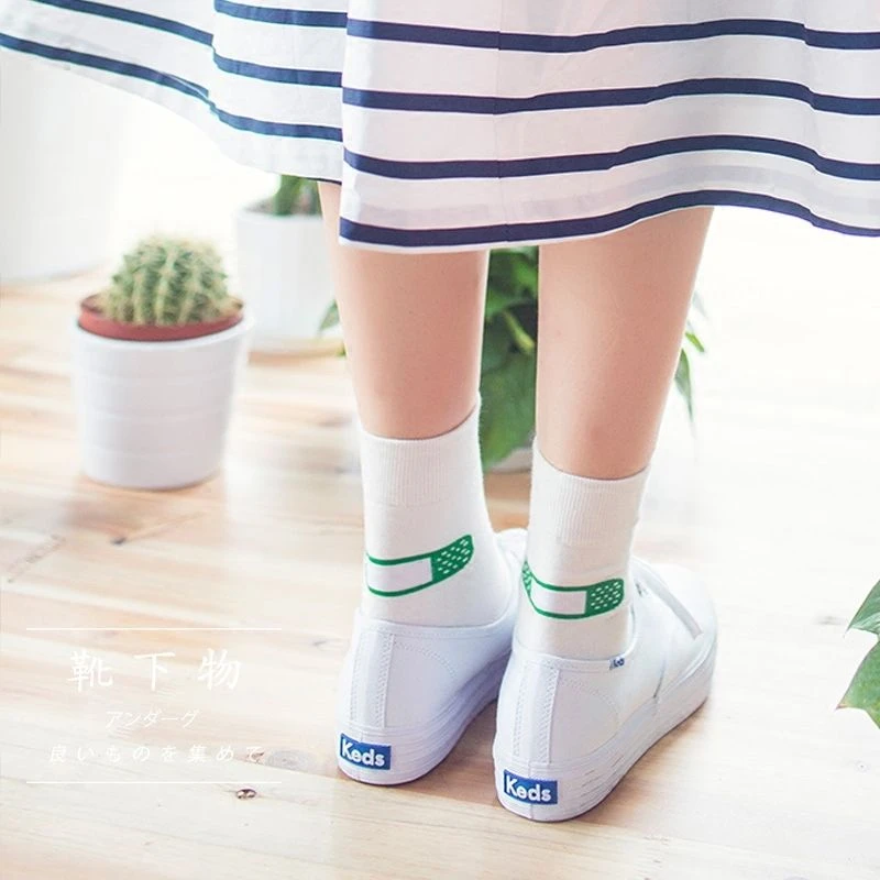 in keds and tube socks