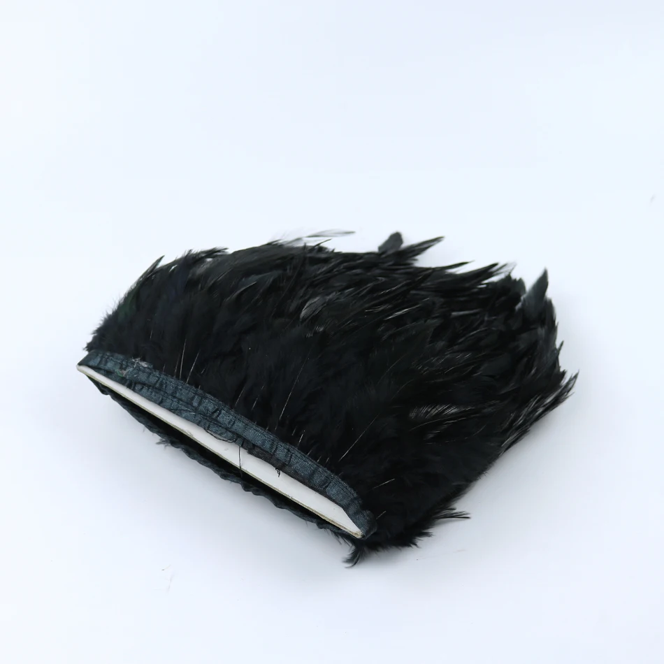 2 black rooster saddle feather trims 2