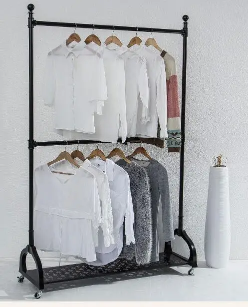 Tieyi clothing store. Display rack. Male and female children's wear double pole lift and floor type with wheel hanger.1