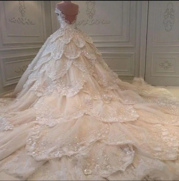 

Luxury Dubai Arabic Off Shoulder Wedding Dresses with Beading Crystals Tiered Tulle Sexy Bridal Gown Illusion Back