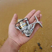 Hot Selling Mini Ice Reel V200–6BB Ice Fishing Wheel 138g 5.2:1 Small Size Palm Spinning Lure Reel Raft And Rock Reel