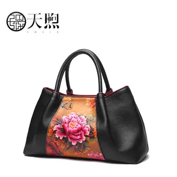 

Pmsix 2018 new large-capacity national wind embossed flower layer leather portable handbag Designer bag