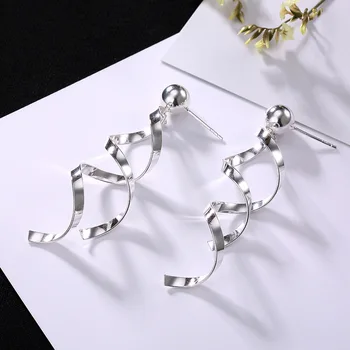 

pure silver the Korean female money refill twist grain exaggerated fashion personality joker silver earrings wholesale