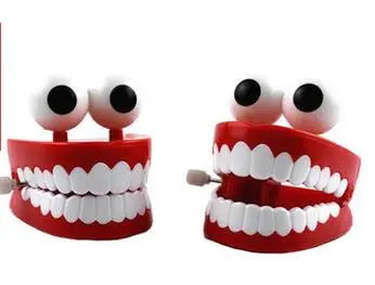 On the chain with eyes teeth jumping tooth clock new exotic toys children fun gift