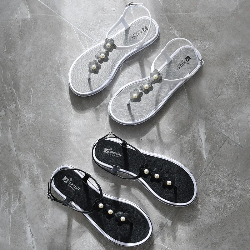 

2019 summer new style simple and simple color flower decoration sandals women comfortable wild Roman style beach sandals