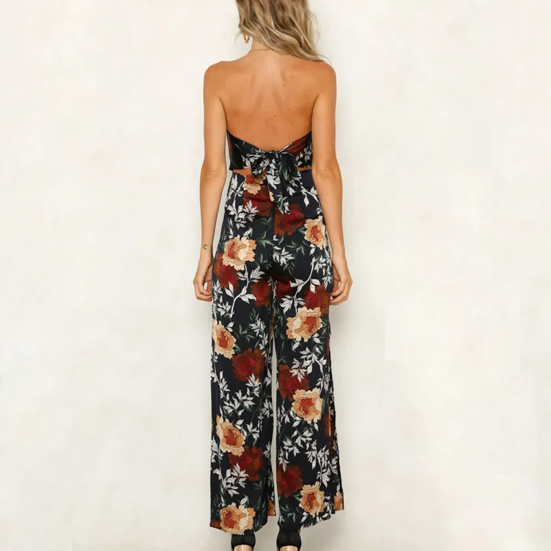 DORVIVON Sexy Backless Floral Print Boho Beach Jumpsuits Women 2019 Summer Sleeveless Rompers Elegant Wide Leg Jumpsuit Femme