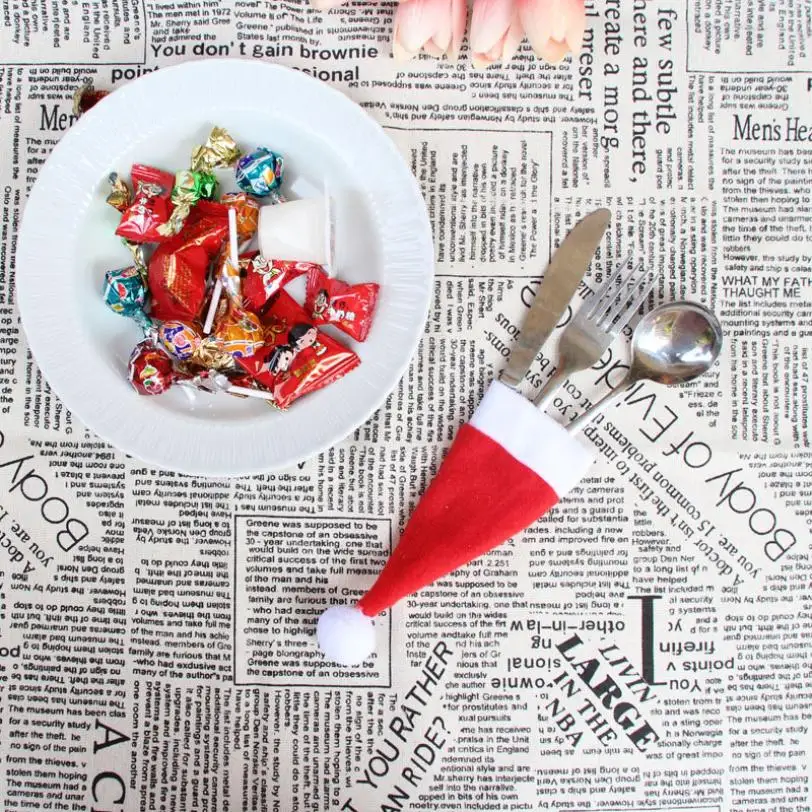 

2018 Christmas hat covered bag candy gift bags cute pocket fork knife holder Candy Table Decorative Storage Tool 7.30