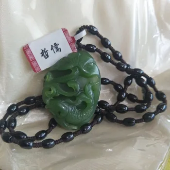 

Zheru Jewelry The one and only hand-carved natural Hetian jasper lotus leaf and fish pendant necklace