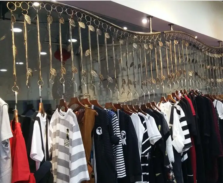 Clothing store display stand. On the wall side rack. Retro combination racks. Hanging.009