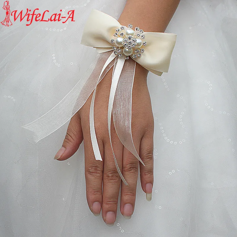 

Wifelai-a Ivory Bow Tie Flowers Pearl Diamond Wrist Flowers Bride Ribbon Silk Hand Flower Wedding Corsages SW526-17