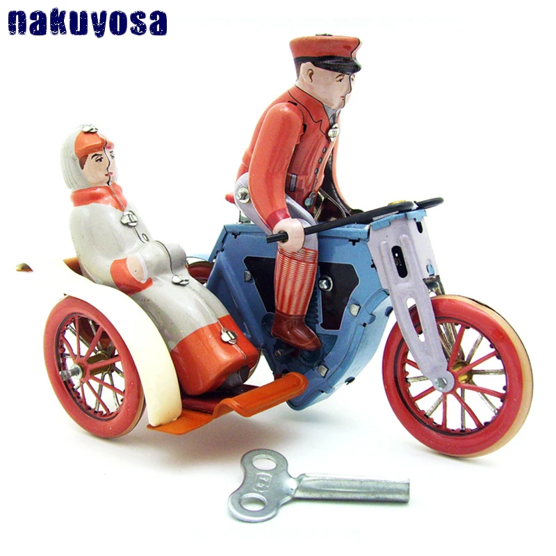 

Collection Retro Wind Up Tin Toy Metal Man Clockwork Toy Riding Tricycle Mechanical Toy Figures Model Kids Gift