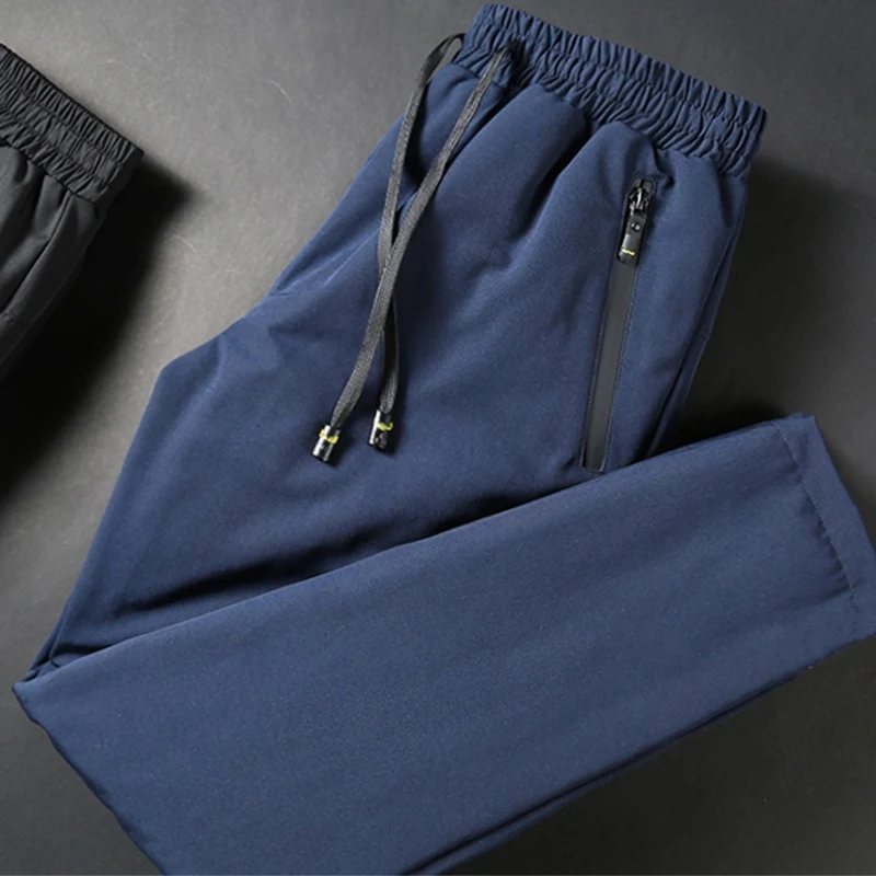 

jsbd Down pants men wear winter trim outdoor warm young men thickened white duck down cotton pants tide