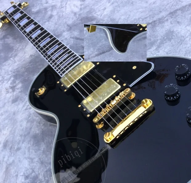 

Free delivery, black electric guitar, color logo and shape can be customized according to customer requirements.