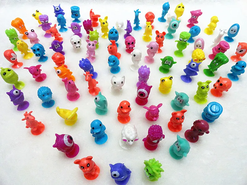 100Pcs lot Plastic Monster Sucker Dolls kids Animal Cupule Suckers Action Figure Toy Suction Cup Collector
