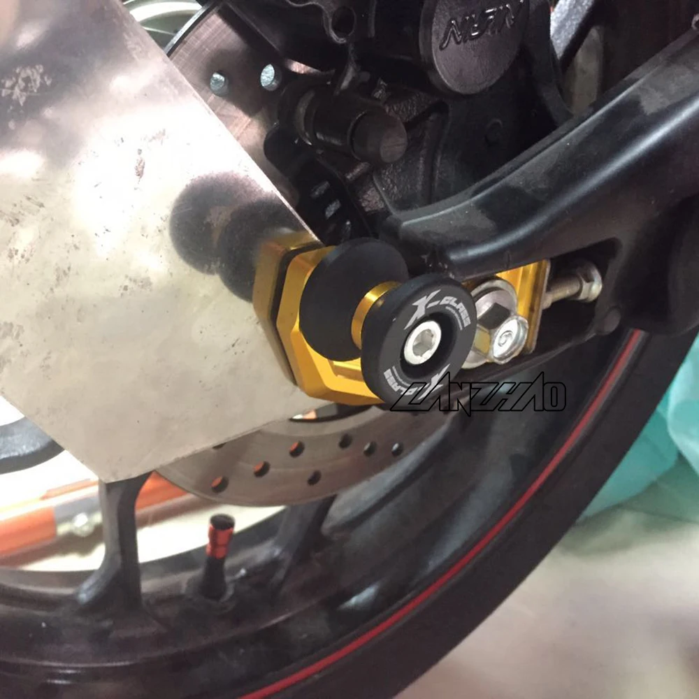 cb500x swingarm spools (4)