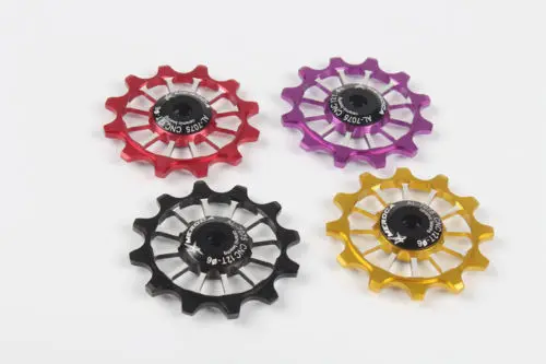 

MEROCA MTB Road Bike Rear Derailleur 12T Guide For 8.9.10.11 Speed Cycling Ceramics/Metal Pulley Bearing Wheel 1pcs 4 Colors