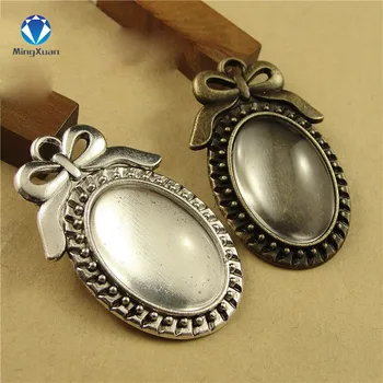 

MINGXUAN 10pcs/lot filigree bowknot cameo cabochon base Blanks setting pendant tray 18*25mm Jewelry Findings