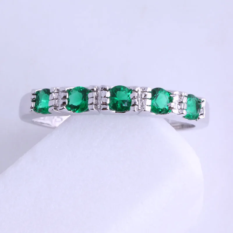 Женское составное кольцо с зеленым кристаллом серебристого цвета