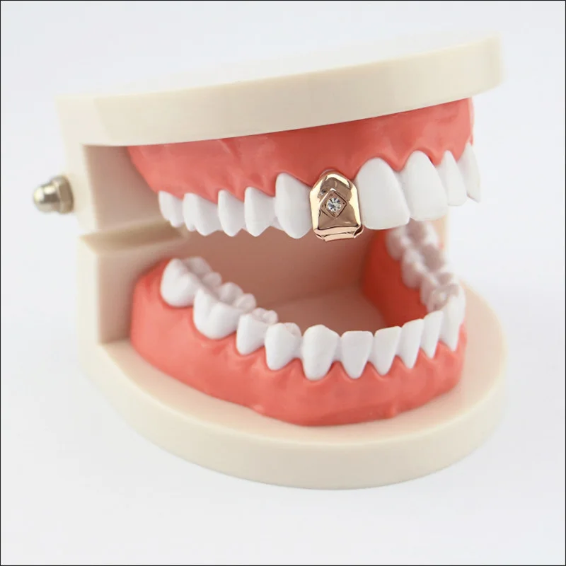 

Mainlead Punk Rhinestone Gold Teeth Top & Bottom Hiphop Single Grills Cosplay Tooth Caps Halloween Party Jewelry