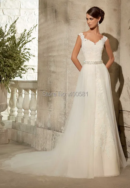 Famous V Neck Cap Sleeves Lace Liques On Net Bridal Gown With Famous V Neck Cap Sleeves Lace Liques On Net Bridal Gown With Removable Tulle Overlay