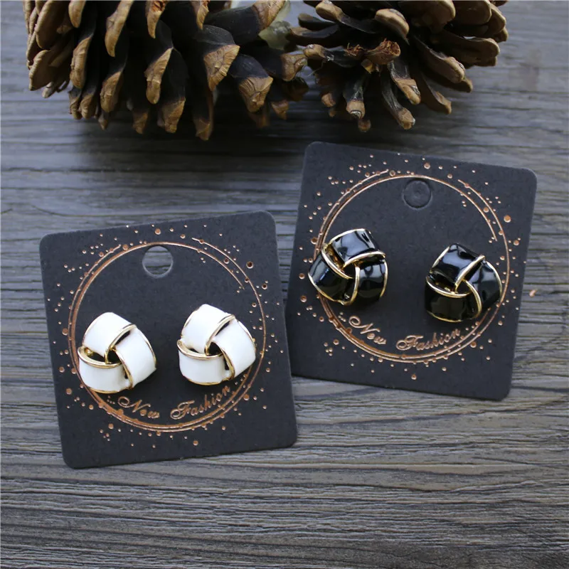 

Japanese and Korean style elegant fashion wild temperament simple personality winding Black white Enamel stud earrings