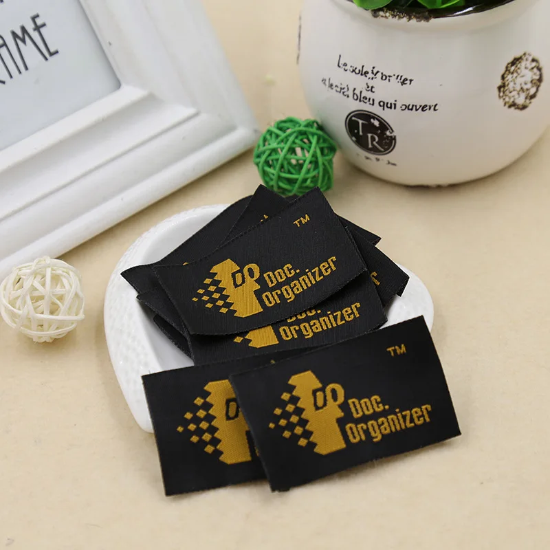 

Specializing in the production of clothing label cloth standard custom suit lingbiao woven label free customized