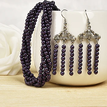 

Black Carry secretly is worn purple wrap style chic Synthesis pearl necklace and curtain earrings The beads were assembled