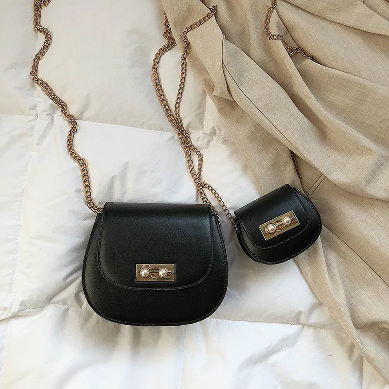 

Pearl lock shell saddle bag Creative small pig girl bag 2019 new chain shoulder bag PU leather messenger bag