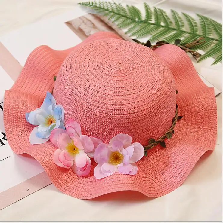 

Han version of the wave of the flower straw hat parent-child sun visor.
