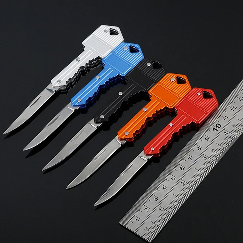 Portátil Camping supervivencia al aire libre plegable de bolsillo clave anillo de forma de cuchillo herramienta pelador Mini acampada llave anillo herramienta Multicolor