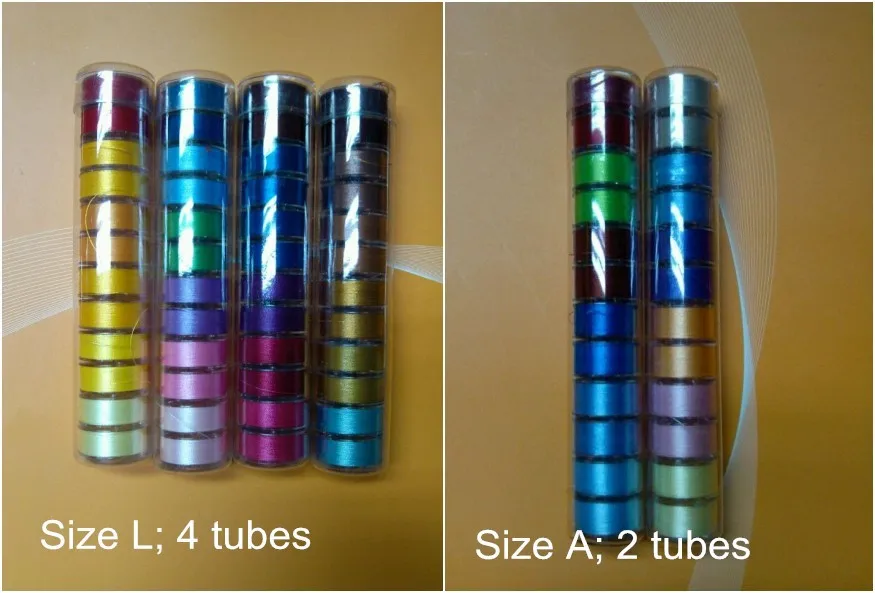 Colored prewound bobbins
