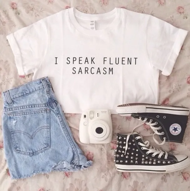 lohscw-l-610x610-white-quote-converse-black+sneakers-studded-studs-denim+shorts-shorts-outfit-polaroid+camera-white+t+shirt (1)