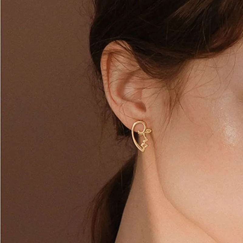 

Original Vintage Arsty Alloy Gold Silver Filled Hollow Out Face Stud Earrings For Women 2018 Chic Korean Mini Outline Earrings