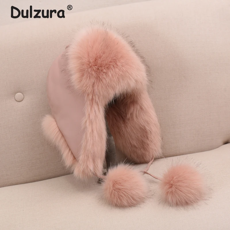 

Chic Pink Faux Fox Fur Pompom Bomber Hats for Girls Women Winter Thick Warm Russian Ushanka Hat Windbreaker PU Pom Pom Cap Femme