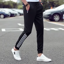 Men's stretch casual pants 2021 spring classic brand clothing elastic waist large size men's fashion jogging pants black blue